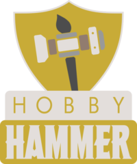 A logo of a hammer and a brush in a shield with the words 'Hobby Hammer' below.